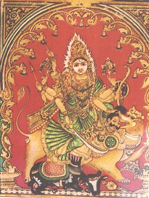 Goddess with curved sword riding on a lion and slaying a demon