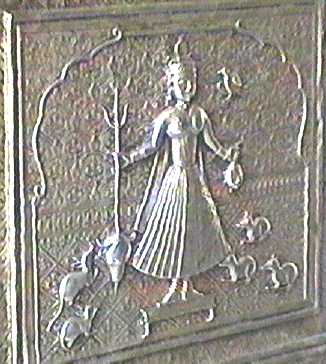 Woman standing carrying a trident, with several rats at her feet, embossed on silver panel