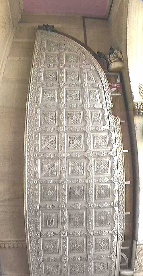 Heavy silver door embossed with geometric patterns