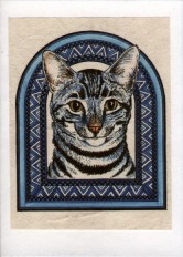 face of young tabby on knotwork background