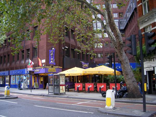 pavement café among modern buildings