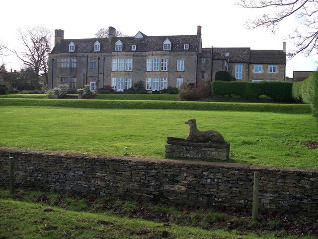 view of eighteenth century manor house with rolling green lawns