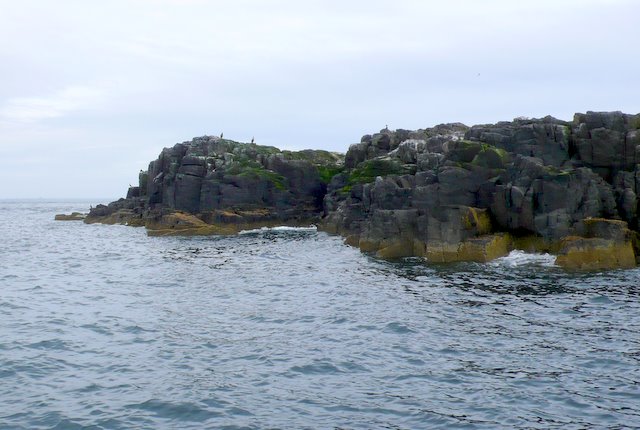 view of irregular rocky sides of small island