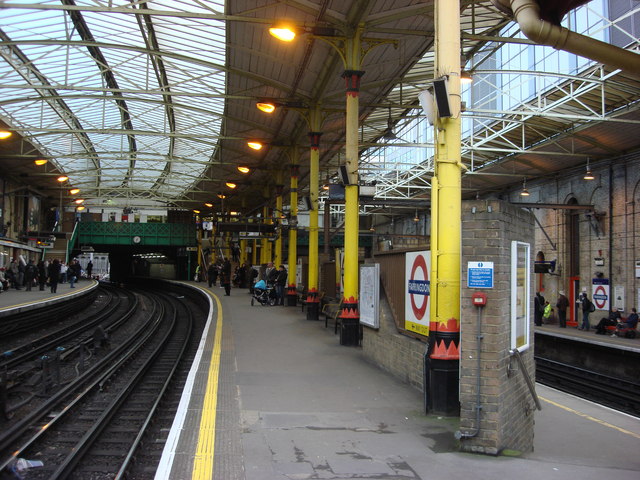railway platforms with painted pillars and vaulted glass roof