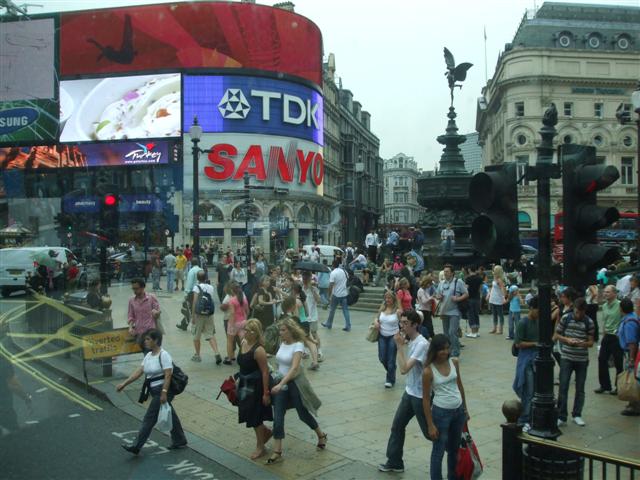 view of Piccadilly Circus showing advertising hoardings and winged statue