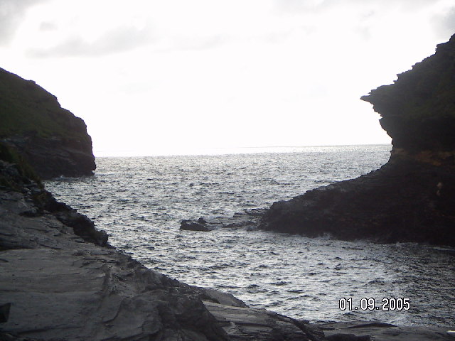 view of two lowish black cliffs curving in from either side