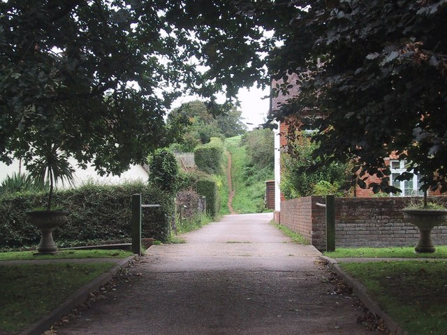 view across formal terrace to a steep footpath
