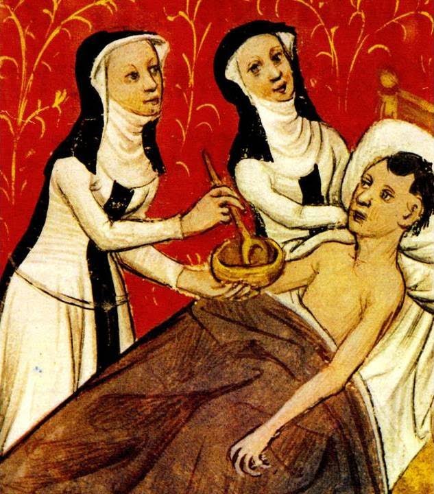 Brightly-coloured Mediaval painting with a red and gold background, showing two nuns in black-and-white-striped habits, spoon-feeding a bare-chested man lying in a bed