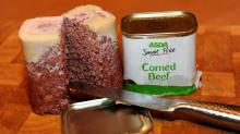photo of tin of Asda corned beef, with an exposed block of corned beef beside it