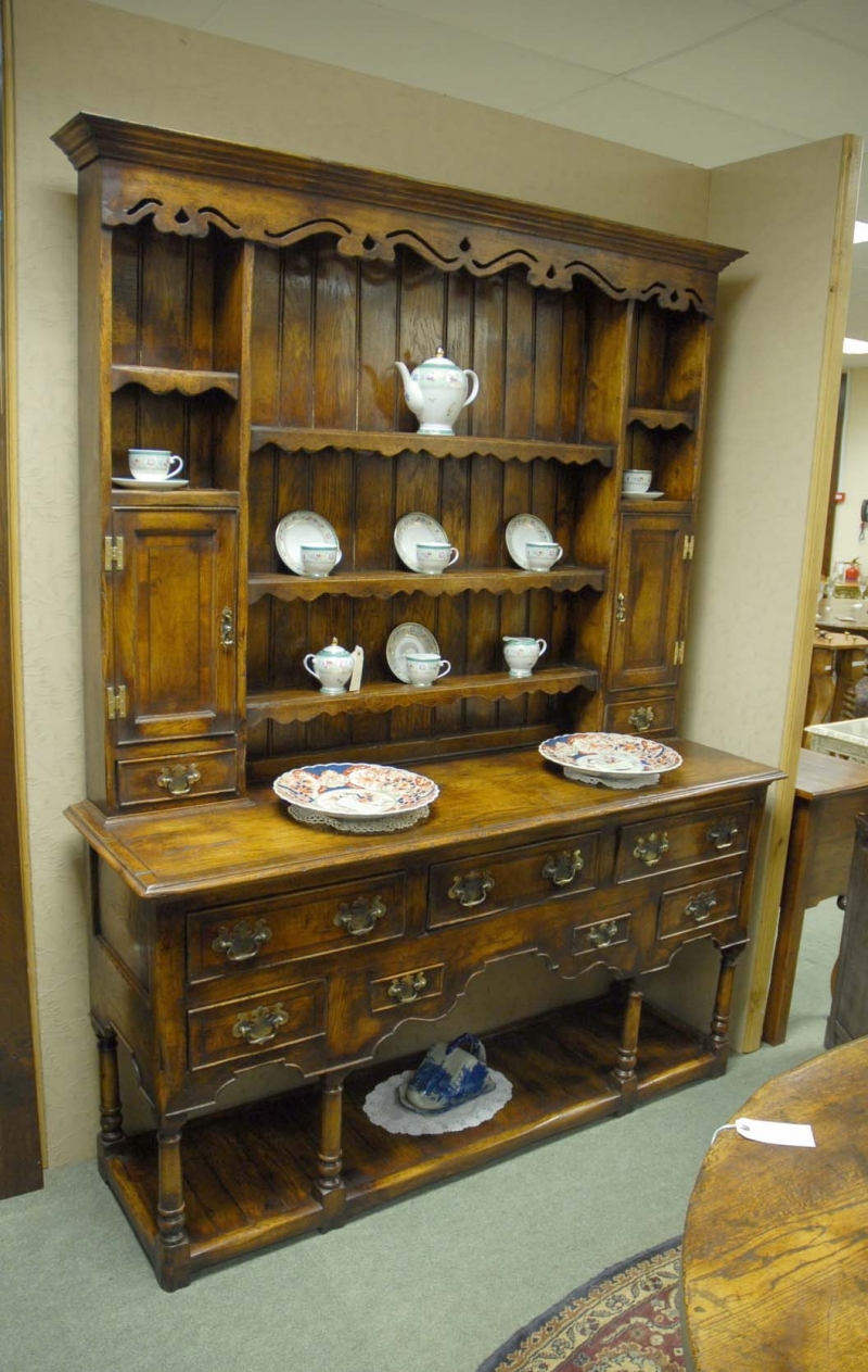 Photo of large, ornate Welsh dresser with crockery on it