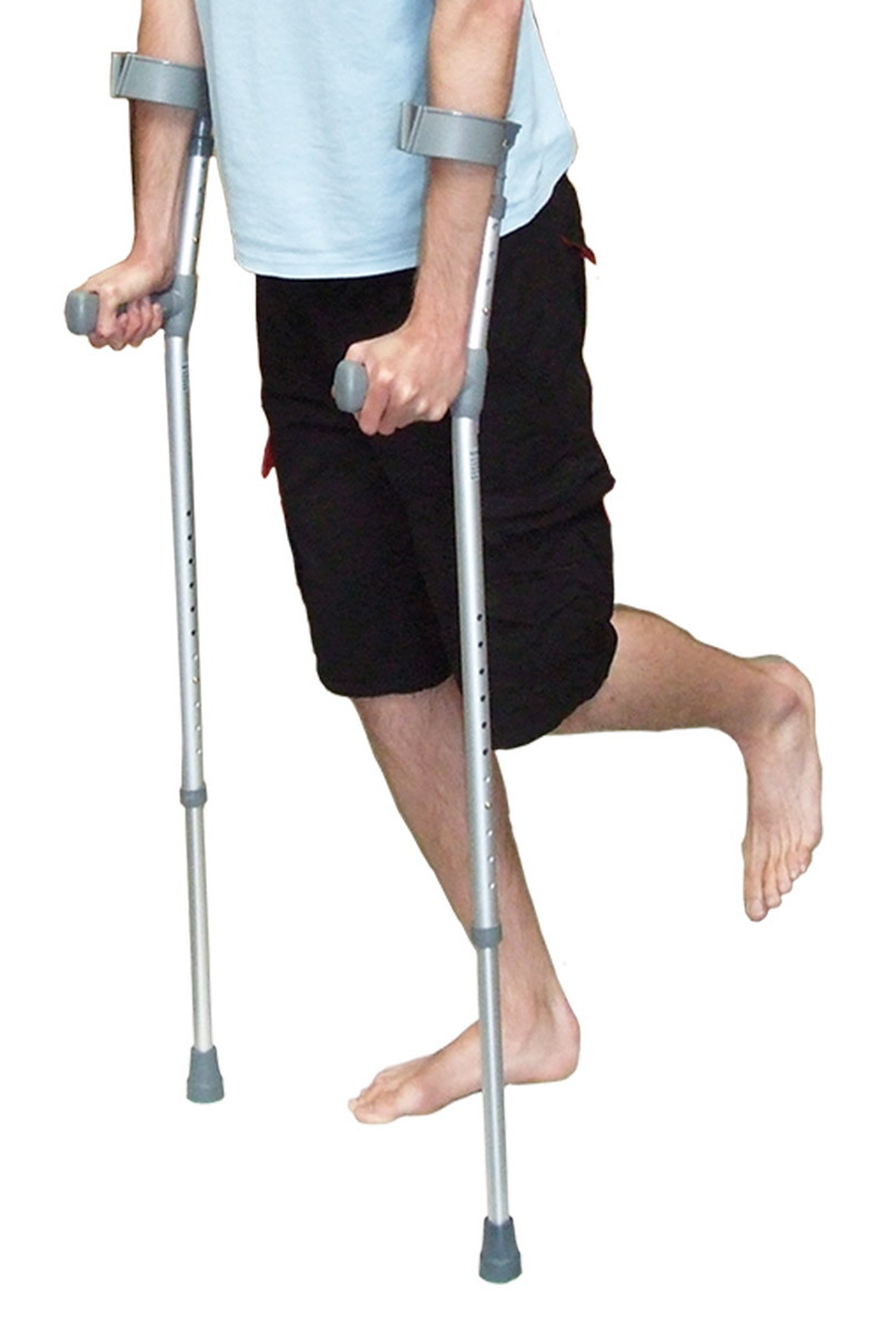 Photo of m,and from chest down, wearing dark shorts and pale T-shirt and using elbow crutches
