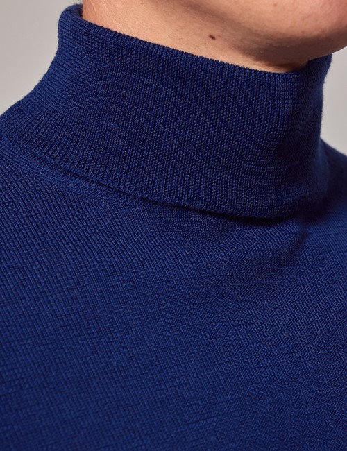 Photo of chest and neck of dark blue polo-neck sweater