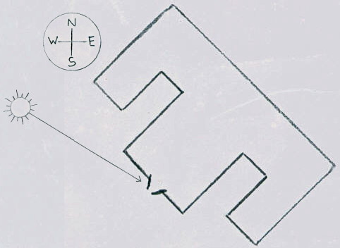 line drawing of block shaped like an E with a long, fat middle bar, at 45° angle