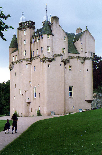 tall narrow building with mad turrets around the top